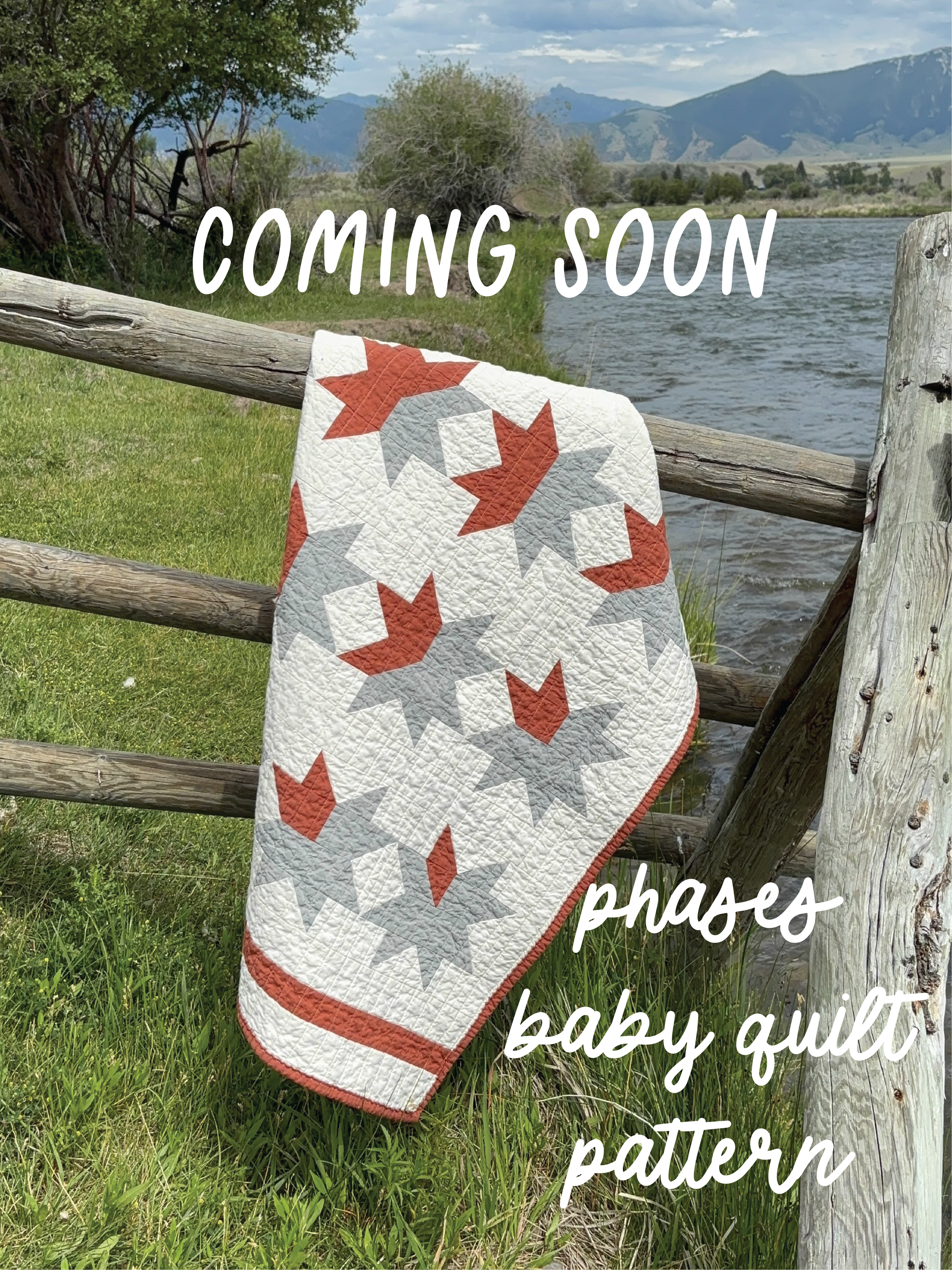A quilted fabric panel with a repeating star pattern in red, blue, and white is draped over a rustic wooden fence outdoors near a river and mountains. Large text reads 'COMING SOON' and 'phases baby quilt pattern'.